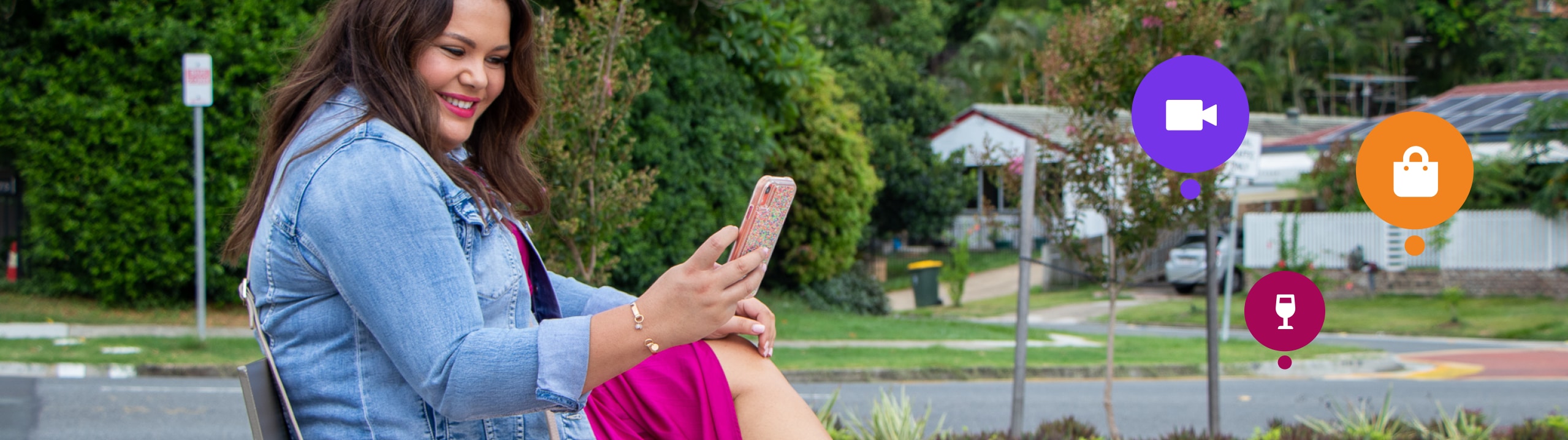 Banner image showing someone sitting on a park bench using the Brisbane app.